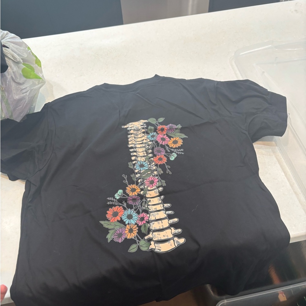 Black T-Shirt with Floral Spine Design